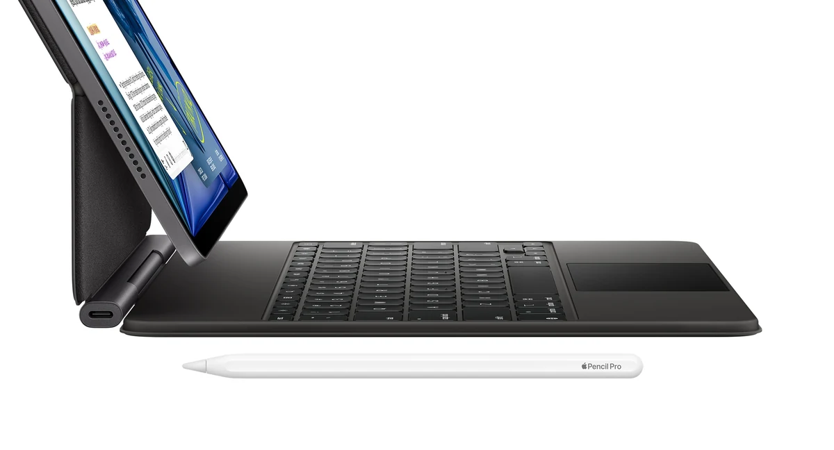 iPad Air on Magic Keyboard and Apple Pencil Pro in front.