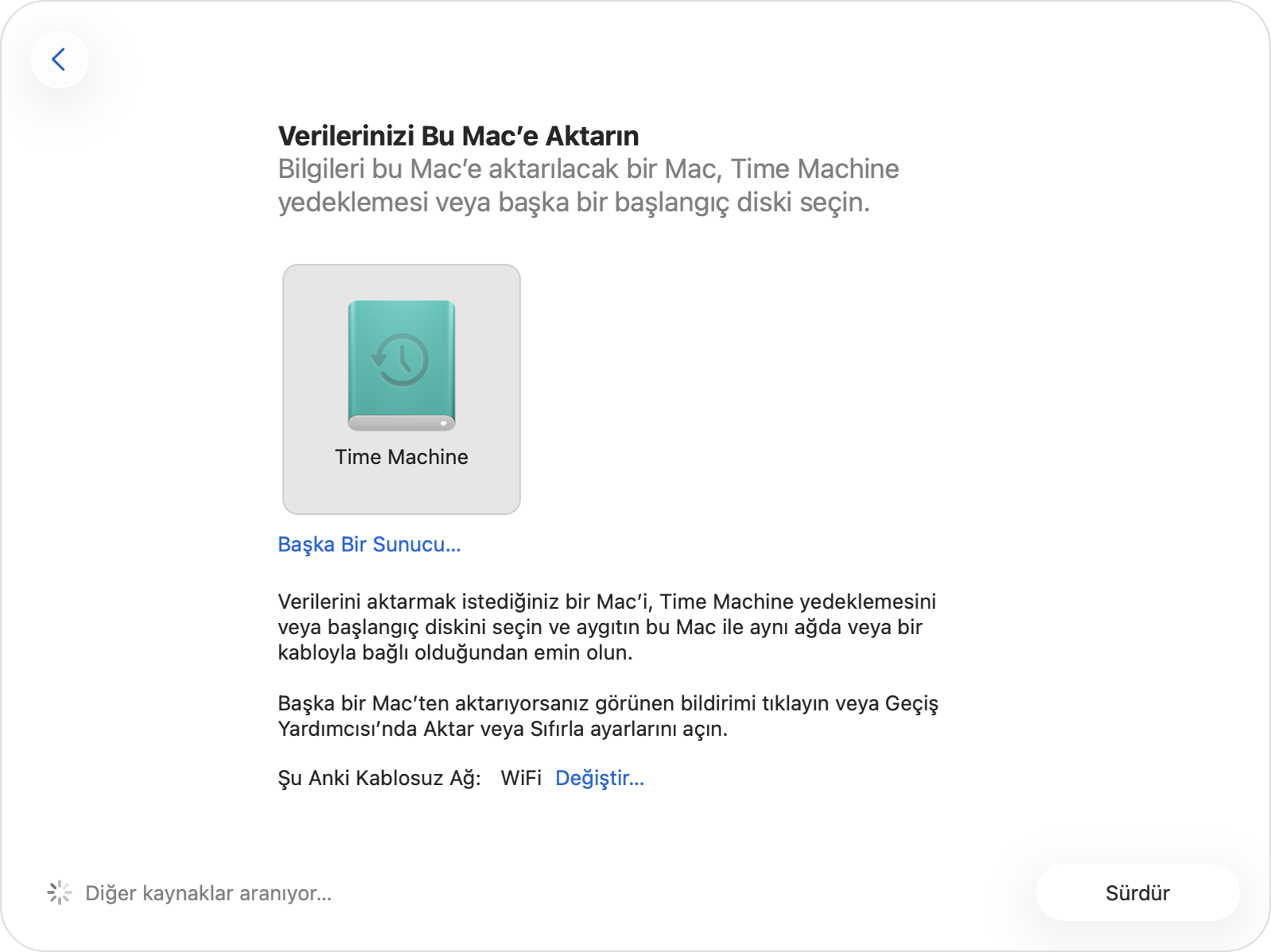 Selecting the Time Machine backup disk in Migration Assistant